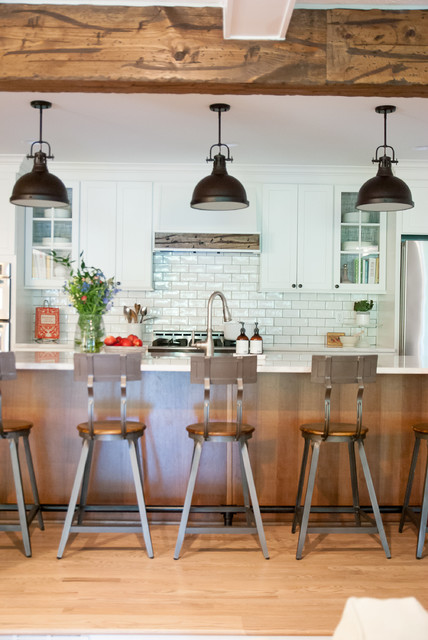 Rugged Timber Beam Replaces a Wall in This Wood-and-White Kitchen (6 photos)