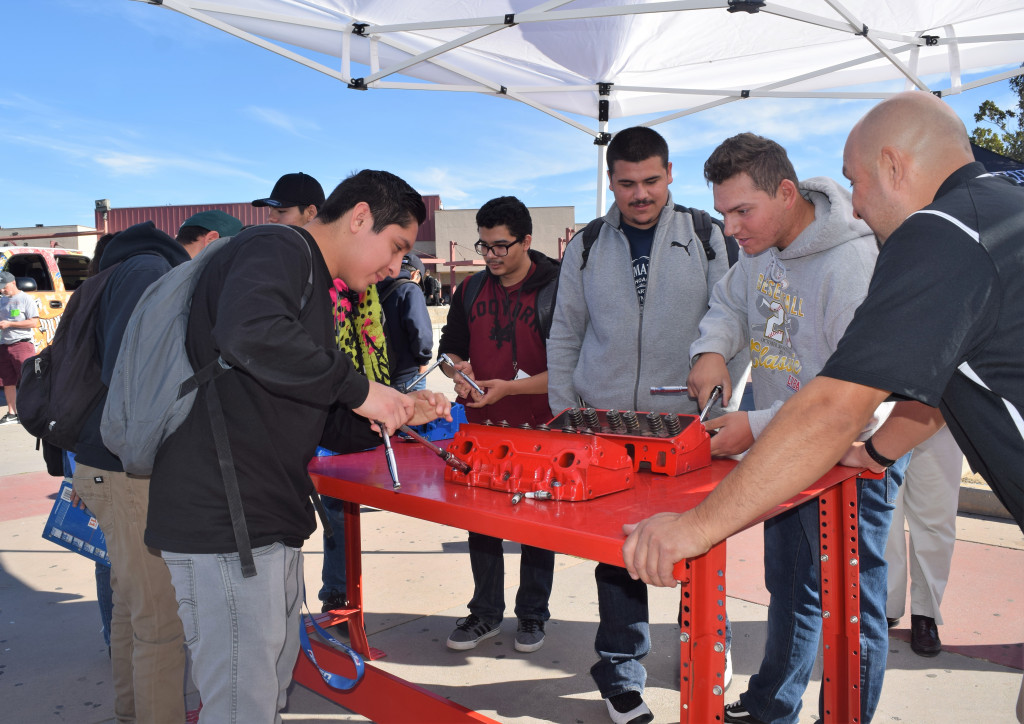 Students from A.B. Miller High in Fontana learn about auto tech careers