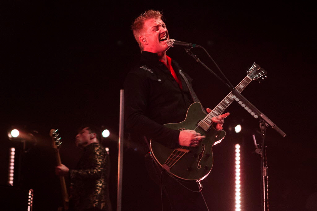 Queens of the Stone Age rocks through new tracks and draws famous faces to the sold-out Forum Saturday night