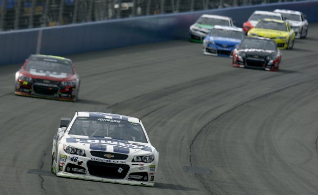 Sprint Cup Series driver Jimmie Johnson (48) leads the race with 20 laps to go during the Auto Club 400 at Auto Club Speedway Sunday in Fontana, CA. March 23,  2014.